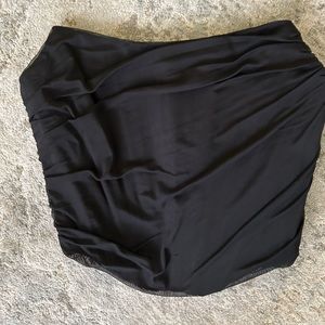 Black corset going out top